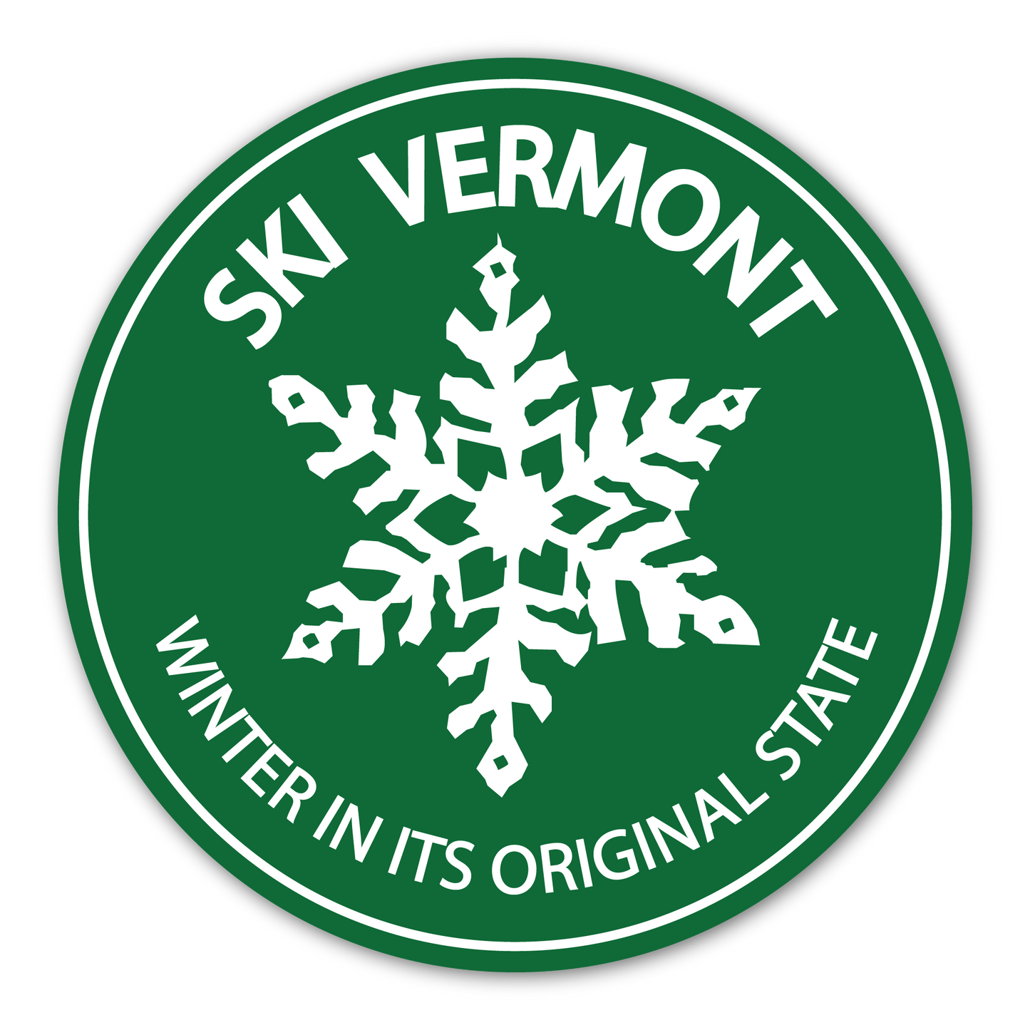 Round green Ski Vermont sticker with a large white snowflake and the text “Winter in its Original State.”